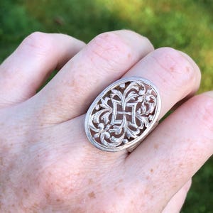 Sterling ring marked Israel, open-work pierced design