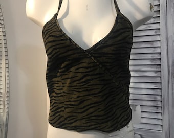Zebra-print suede camisole in khaki green and black, with a back zipper. Available in sizes Small and Large. Oscar Leopold
