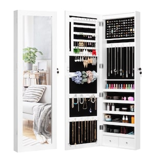 May include: White mirrored jewelry cabinet with a full-length mirror on the left side and a compartment with shelves and hooks for jewelry storage on the right side. The cabinet has two drawers at the bottom.