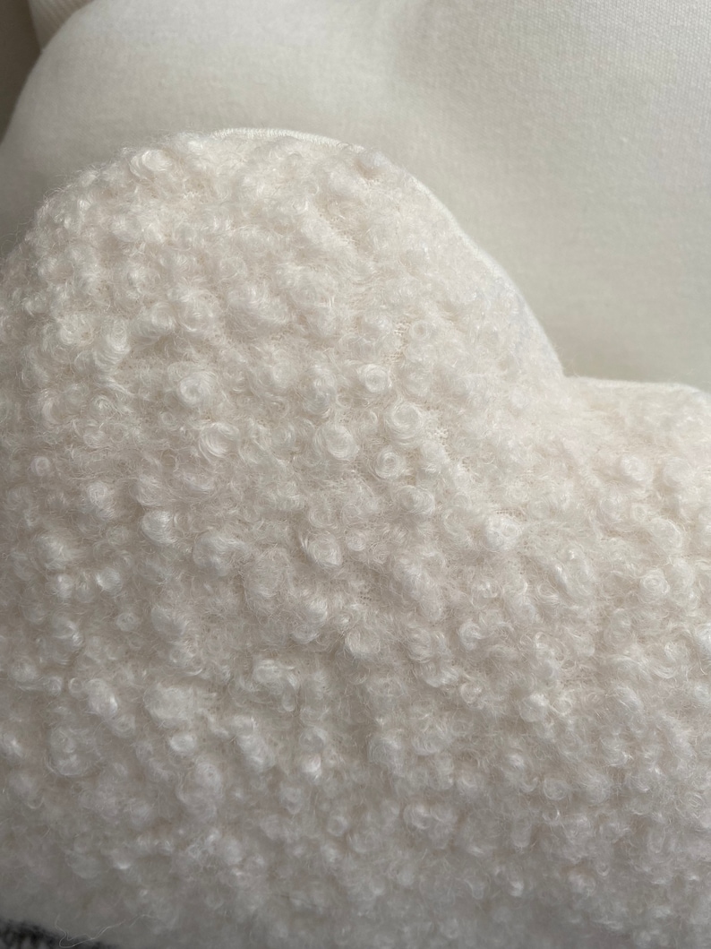 Handmade boucle cloud cushion close up detail