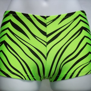 May include: Green and black zebra print underwear.