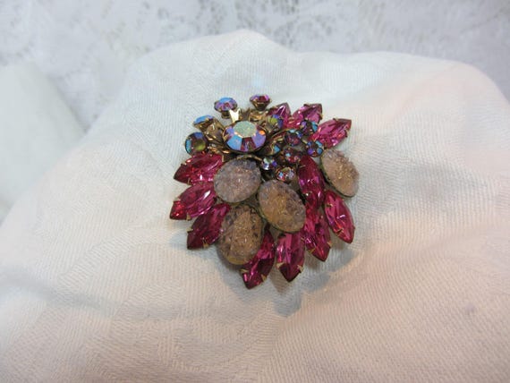 Vintage Pink Brooch Featuring Gold Tone Riveted Fr