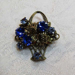 Vintage Gold Tone Metal and Blue Rhinestone Filigree &quot;Basket of Flowers&quot; Brooch