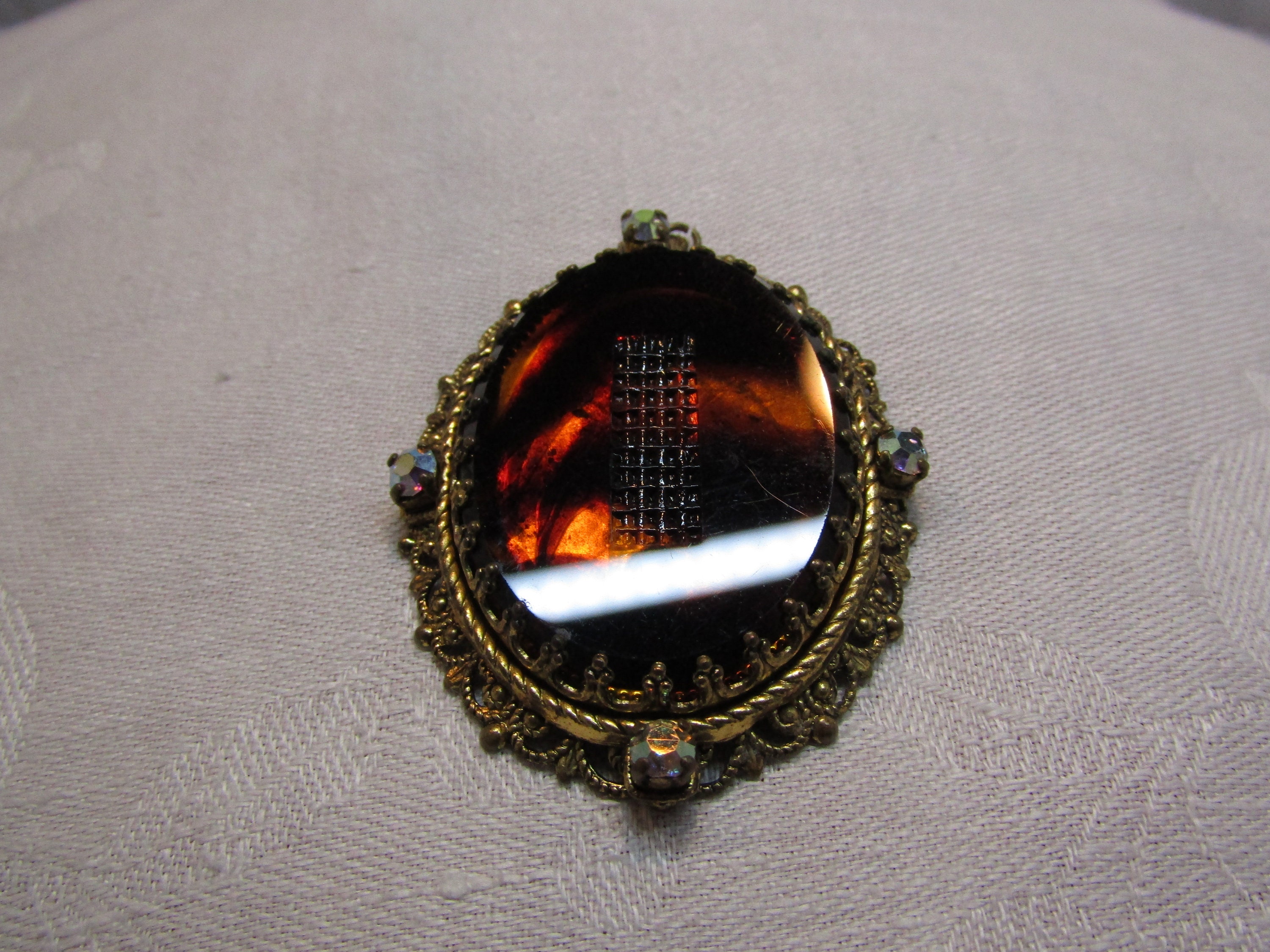 Faux Tortoise Shell Pendant: Gold Tone Filigree With AB