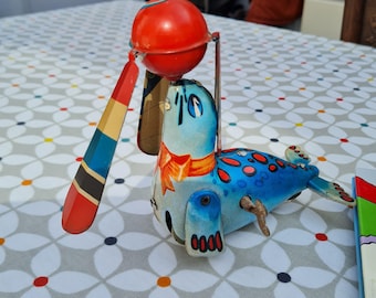 Seal with Propeller Ball Tin Toy