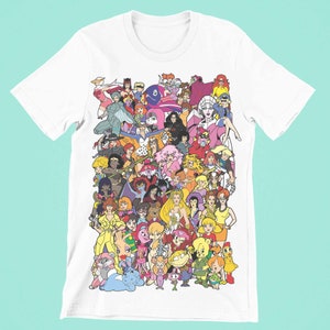 May include: White t-shirt with a colorful graphic print of cartoon female characters from various animated series. The characters are arranged in a chaotic and playful manner, creating a vibrant and nostalgic design.