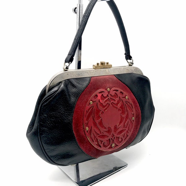 1950’s Black Pebble Leather And Red Suede Handbag Gold And Silver Tone Hardware - Metal Medallion Embellishment By Roger Van S