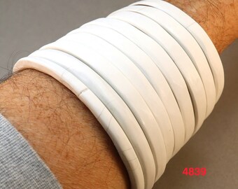 stack of tapered bangles L 4839
