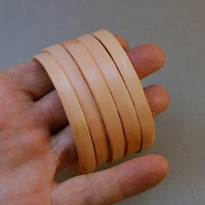 stack of slender bangles sizes L 4837