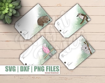 May include: Four printable gift tags featuring watercolor illustrations of Australian animals. The tags are white with a green watercolor background and have the words "To:" and "From:" printed on them. The animals featured are a koala, a wombat, a kookaburra, and a pink cockatoo.