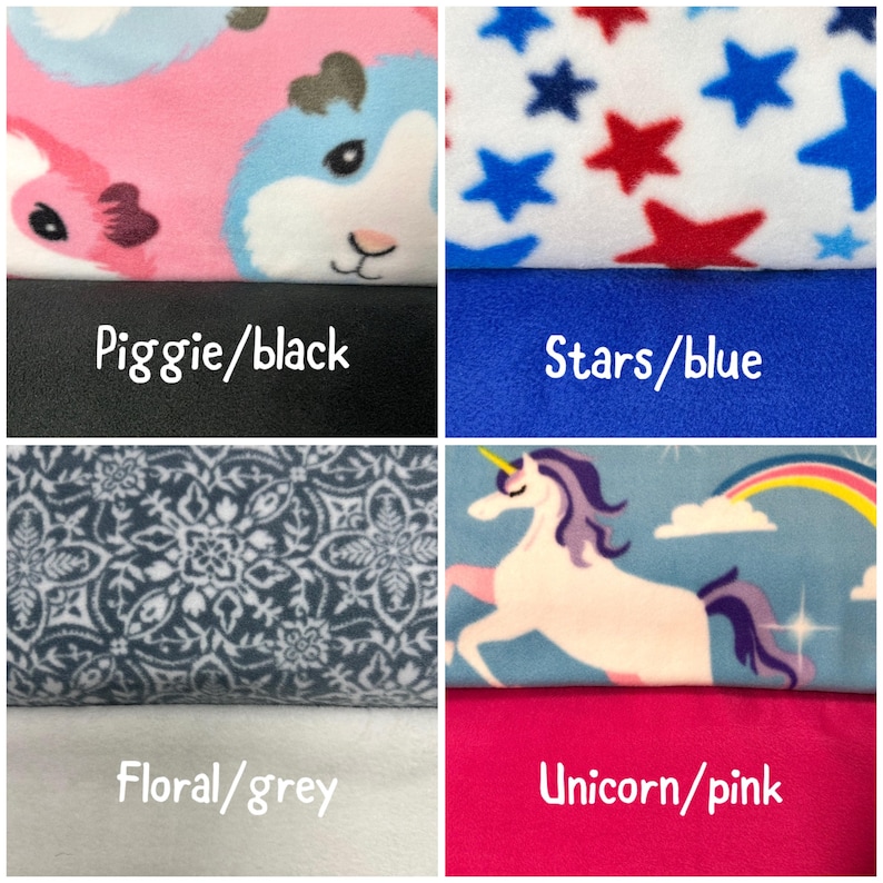 May include: A four-panel grid of fabric swatches. Top left: pink and blue guinea pig print over black. Top right: red and blue stars on white over solid blue. Bottom left: grey floral pattern over solid grey. Bottom right: unicorn and rainbow print over solid pink.