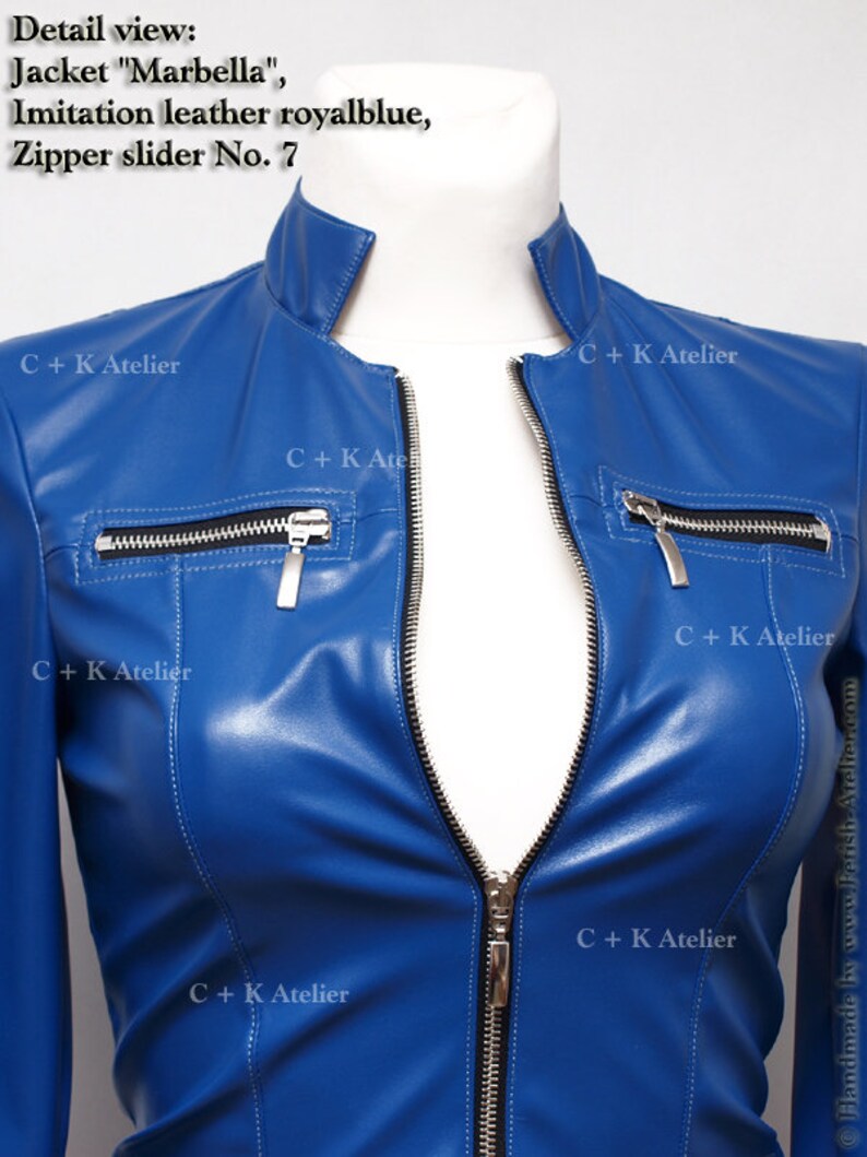 May include: Close-up of a royal blue leather jacket with a silver zipper and black zipper tape. The jacket has multiple pockets with silver zipper pulls. The text "C+K Atelier" is visible on the jacket.