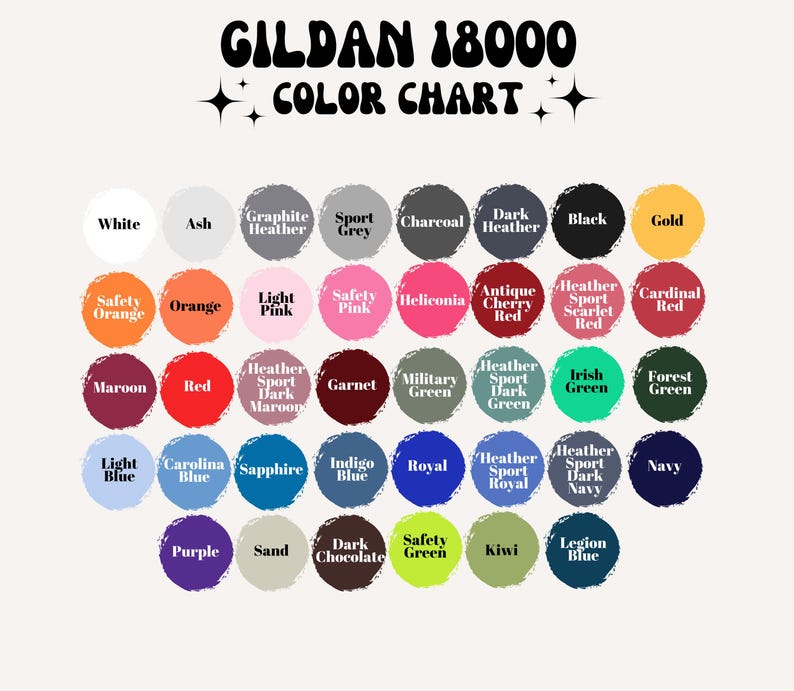May include: A Gildan 18000 color chart displaying a grid of circular paint swatches in various shades including white, ash, grey, charcoal, black, gold, orange, pink, red, maroon, green, blue, purple, sand, and brown with text labels for each color.