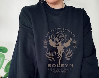 Sudadera de Ana Bolena: Reina de Inglaterra con aires de intelectual de la academia oscura.