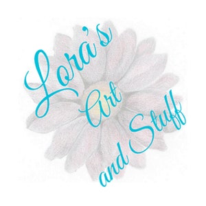 May include: A white daisy with a blue cursive text overlay that reads "Lora's Art and Stuff"