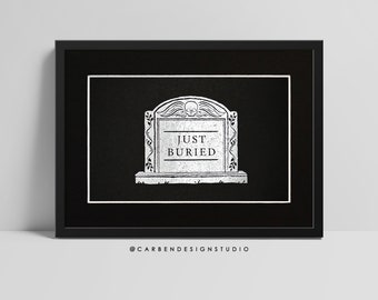 May include: A black and white illustration of a tombstone with the text "JUST BURIED" on it. The tombstone is on a black background. The image is framed in black.