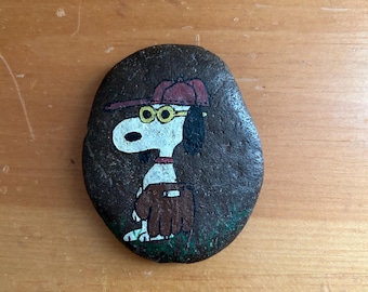 Snoopy peanuts painted rock