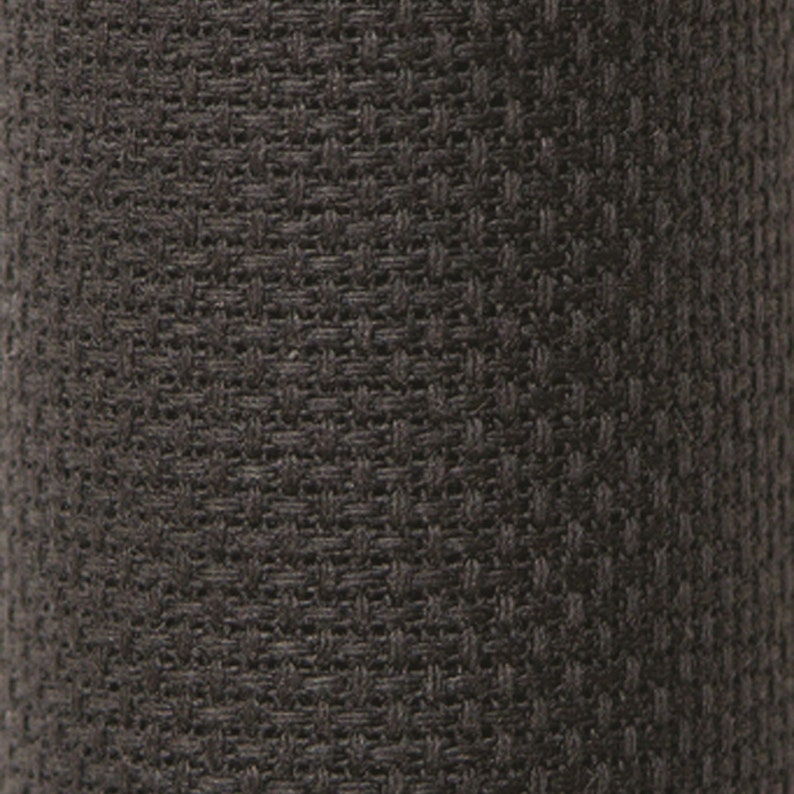 May include: Close-up of a dark gray, textured fabric with a woven pattern. The fabric appears to be tightly woven, creating a subtle, repeating geometric design. The color is a muted, neutral tone.