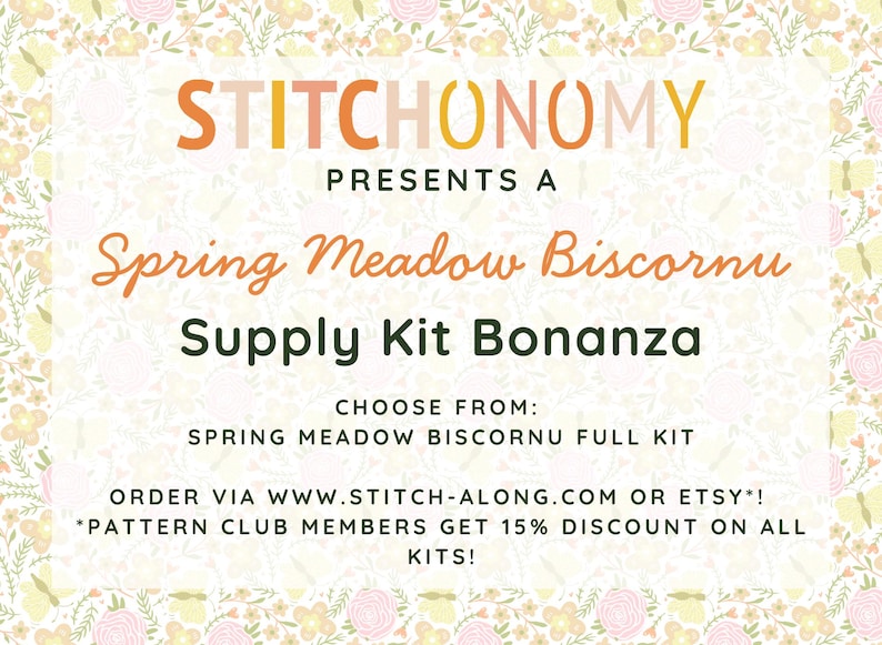 May include: A promotional graphic for a Spring Meadow Biscornu Supply Kit Bonanza. The text is in orange and green, with a floral border. The kit includes a full kit and is available via website or Etsy.