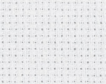 May include: Close-up of a white fabric with a woven texture. The weave pattern is a grid of small, evenly spaced squares, with subtle variations in the white threads creating a textured appearance.