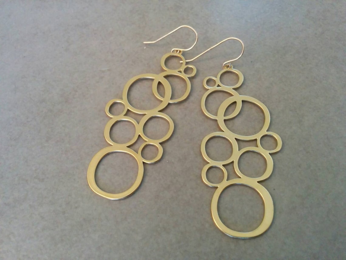 •GLIDE• gold dangle earrings main image 1