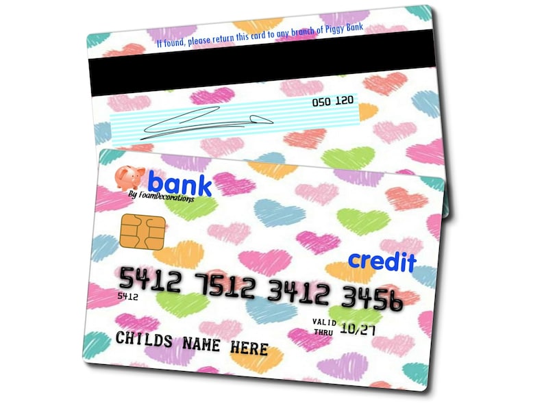 May include: A white plastic credit card with a colorful heart pattern. The card has the text "bank" and "credit" on it. The card also has the text "5412 7512 3412 3456" and "CHILDS NAME HERE".