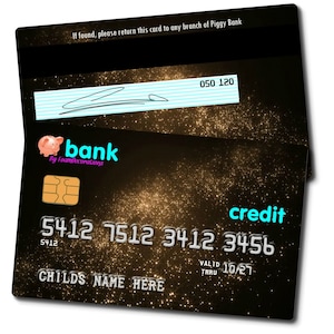 May include: A gold credit card with a piggy bank logo and the text "bank by FoamDecorations". The card number is 5412 7512 3412 3456 and the expiration date is 10/27. The card has the text "credit" in blue.