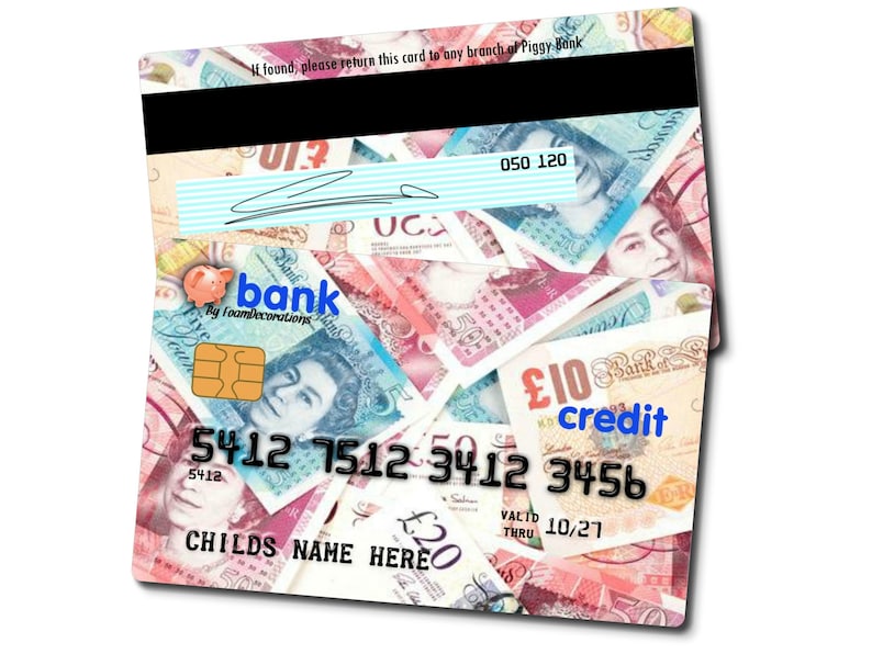 May include: A plastic credit card with a design of British pound notes. The card has the text "Bank by Foamdecorations" and "credit" on it. The card number is 5412 7512 3412 3456. The expiration date is 10/27.