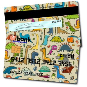 May include: A colorful credit card with a dinosaur pattern. The card has the text "credit" and "bank" on it. The card also has a space for a child's name and a valid through date of 10/21.