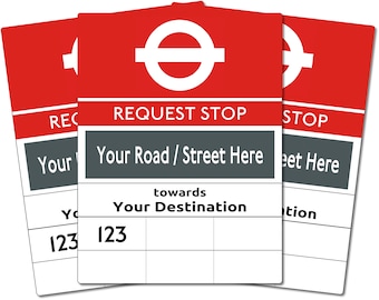 May include: A red and white London Underground request stop sign with the text "REQUEST STOP" and a space to write in your road or street and your destination. The sign also includes the number 123.