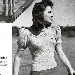 May include: Two vintage knitting patterns for women's jumpers. The first pattern is for a short-sleeved jumper with a striped design. The second pattern is for a short-sleeved jumper with a lacy design. The text on the page reads "Meet the new TOPPER You'll knit it in record time! Again we nominate red, white and blue as your smartest colour-scheme. Design No. 2330 Instructions on Page 16" and "Whatever the occasion this little jumper is sweetly correct, especially with your new suit. Design No. 1472 Instructions on Page 17"