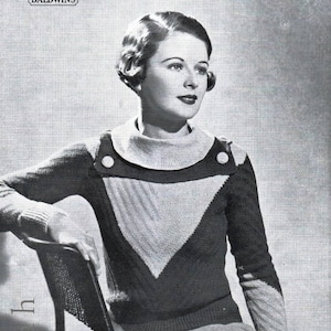 May include: A black and white photograph of a woman wearing a knitted jumper with a geometric design. The jumper has a V-neck and a contrasting colour panel across the chest. The text "JUMPER - "DIANE" DESIGN" is printed at the bottom of the image.