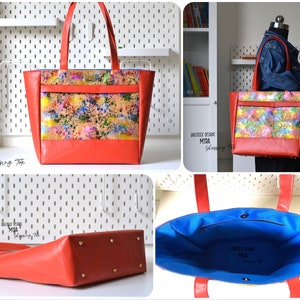 May include: A red tote bag with a colorful, abstract print. The bag has a blue lining and a zippered pocket inside. The bag has gold accents and a "Bagstock Designs Myra Shopping Tote" label.