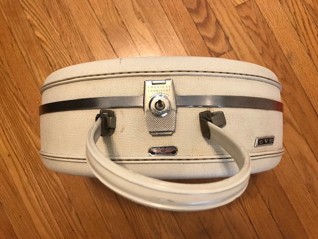 American tourister round suitcase sale