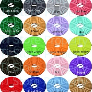 May include: A collection of 24 different colored shoelaces, each wound into a circle. The colors include black, brown, burgundy, coffee, dark green, dark grey, grey, hot pink, kelly green, khaki, lavender, mint, navy, neon green, neon orange, neon yellow, olive, orange, pink, purple, red, royal blue, sky blue, tan, turquoise, white, work tan, and yellow.