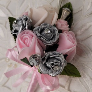 Pink silver corsage wedding flowers