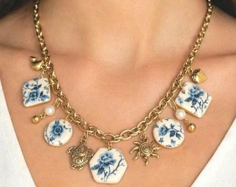 Blue and white polymer clay floral gold charm necklace