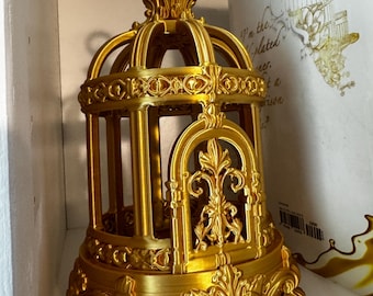 El Dorado – Jaula de fantasía impresa en 3D de 15 cm (6 pulgadas) en oro, decoración romántica fantástica, regalo para amantes de los libros, arte coleccionable. La colección El Prisionero Plateado.