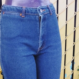 Vintage High waisted Chic blue jeans with gold stitching tight high waisted mom jeans with stretch tag says, h.i.s