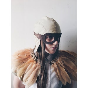 beautiful handmade copper coloured feather cape