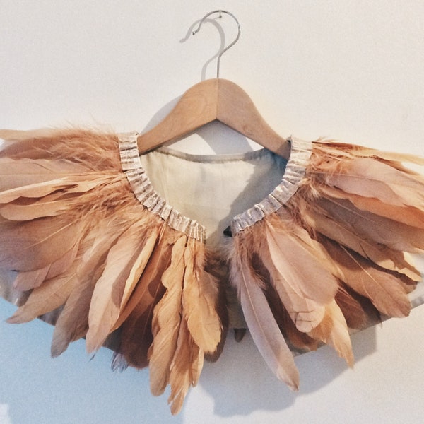 beautiful handmade copper coloured feather cape