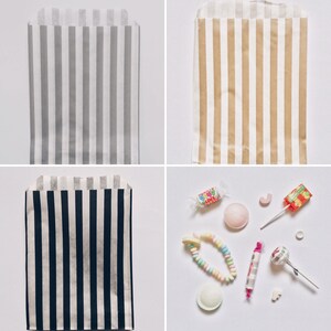 Pu&ograve; includere: Quattro sacchetti di carta a righe in diversi colori e motivi. I sacchetti sono tutti della stessa dimensione e forma. I sacchetti sono perfetti per i favori di festa o i regali.