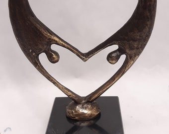 Cuore di scultura per l'elkaar
