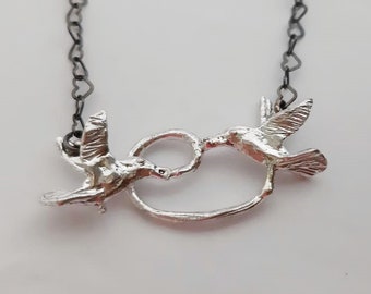 From darkness to light -Hummingbird sterling silver necklace