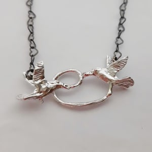 From darkness to light -Hummingbird sterling silver necklace