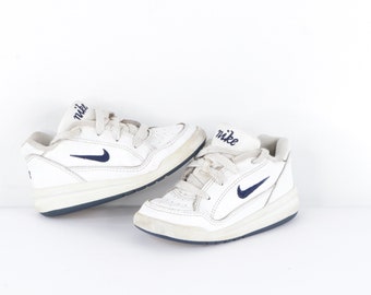 vintage white nike sneakers