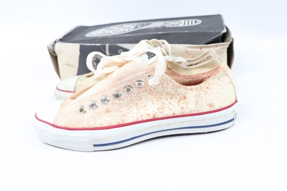 converse bianche macchiate gratis