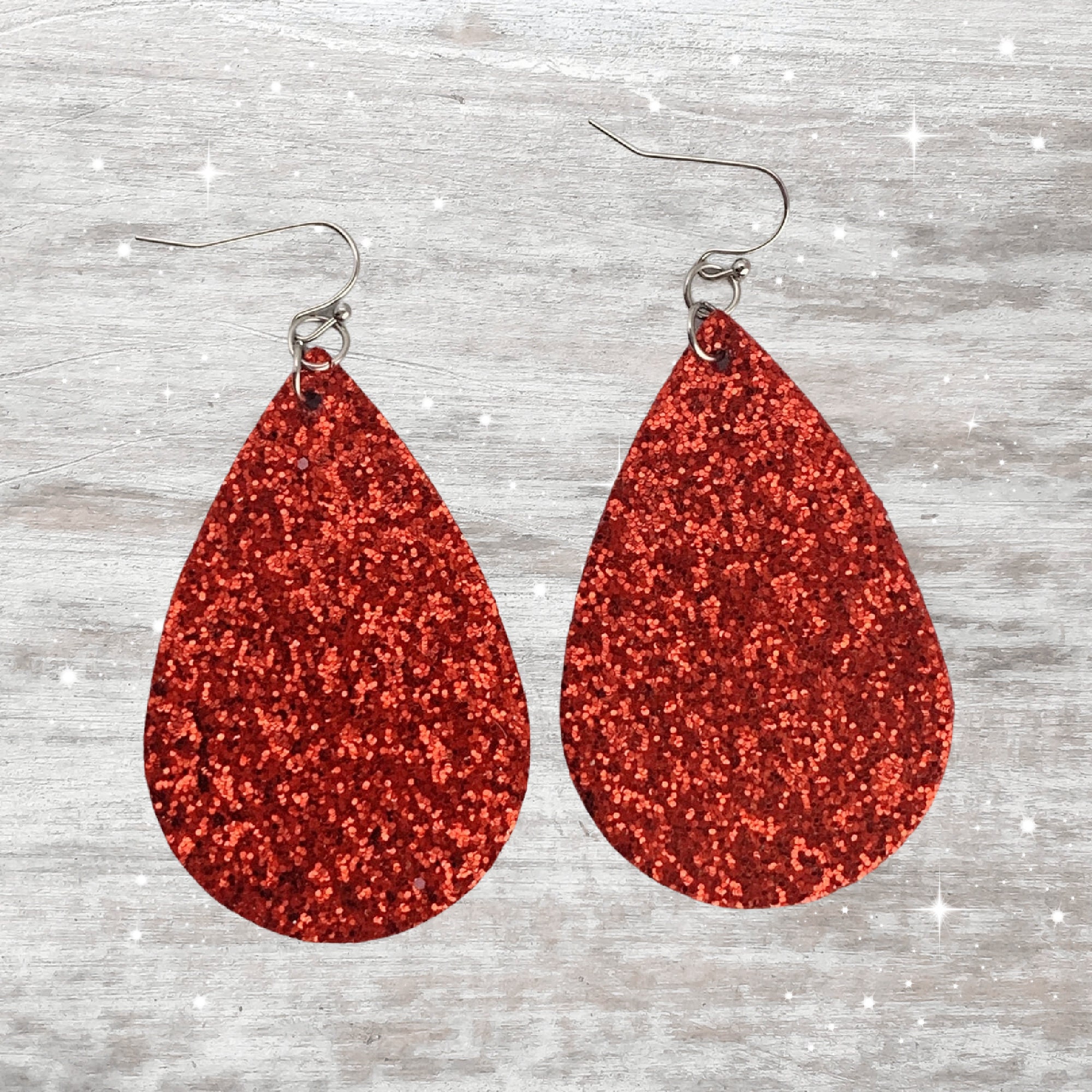 Red glitter earrings discount