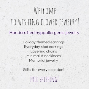 May include: Text on a white background reads "WELCOME TO WISHING FLOWER JEWELRY!" with a list of jewelry types: holiday earrings, stud earrings, layering chains, minimalist necklaces, and memorial jewelry. The text also mentions "Gifts for every occasion!"