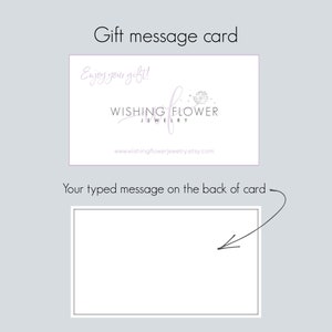 May include: A gift message card with the text "Enjoy your gift!" and the logo for Wishing Flower Jewelry. The card includes space for a typed message on the back, with a website address at the bottom.